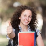 stock-photo-21282541-beautiful-young-student-with-thumb-up