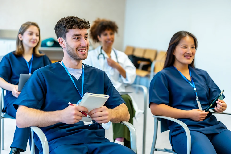 Medical Students Attending A Conference In University Lecture Hall