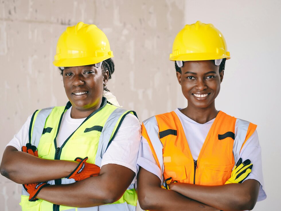 Why Trades Are Australias 1 Pr Pathway For Migrants In 2026 Two Tradeswomen In Hard Hats And Work Vests